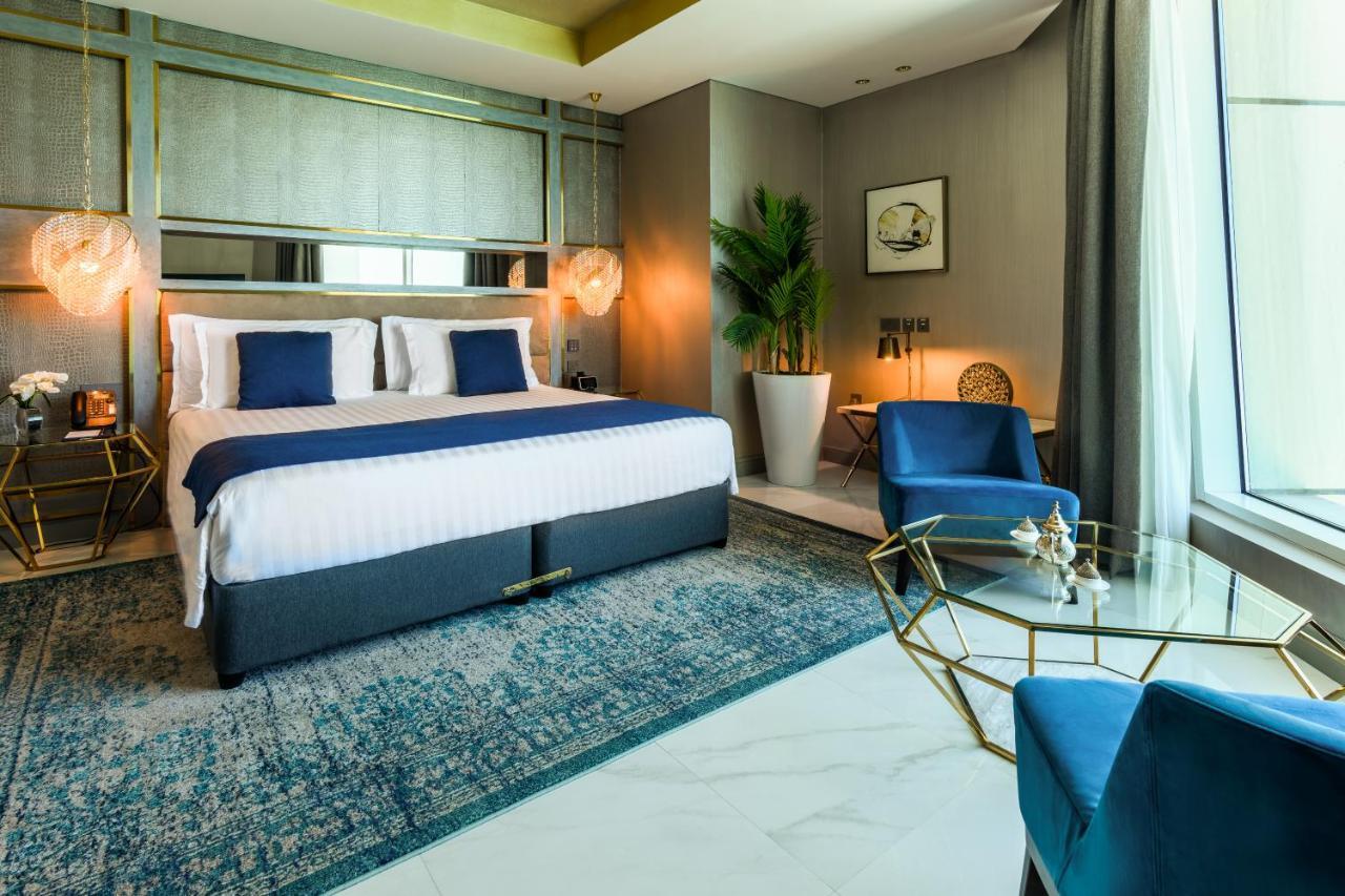 Centara West Bay Hotel & Residences Doha Bagian luar foto Deluxe Room