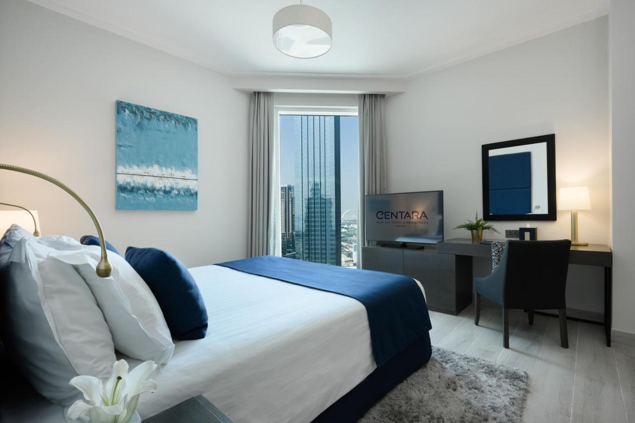 Centara West Bay Hotel & Residences Doha Bagian luar foto A bedroom at the hotel