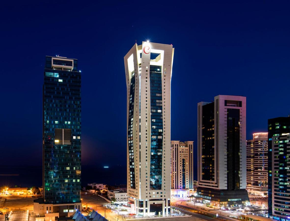 Centara West Bay Hotel & Residences Doha Bagian luar foto The Torch Doha