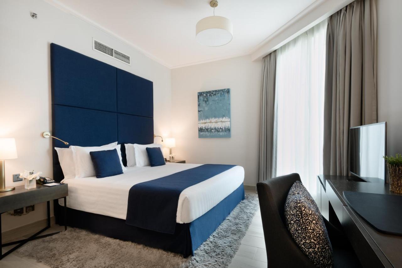 Centara West Bay Hotel & Residences Doha Bagian luar foto Deluxe room