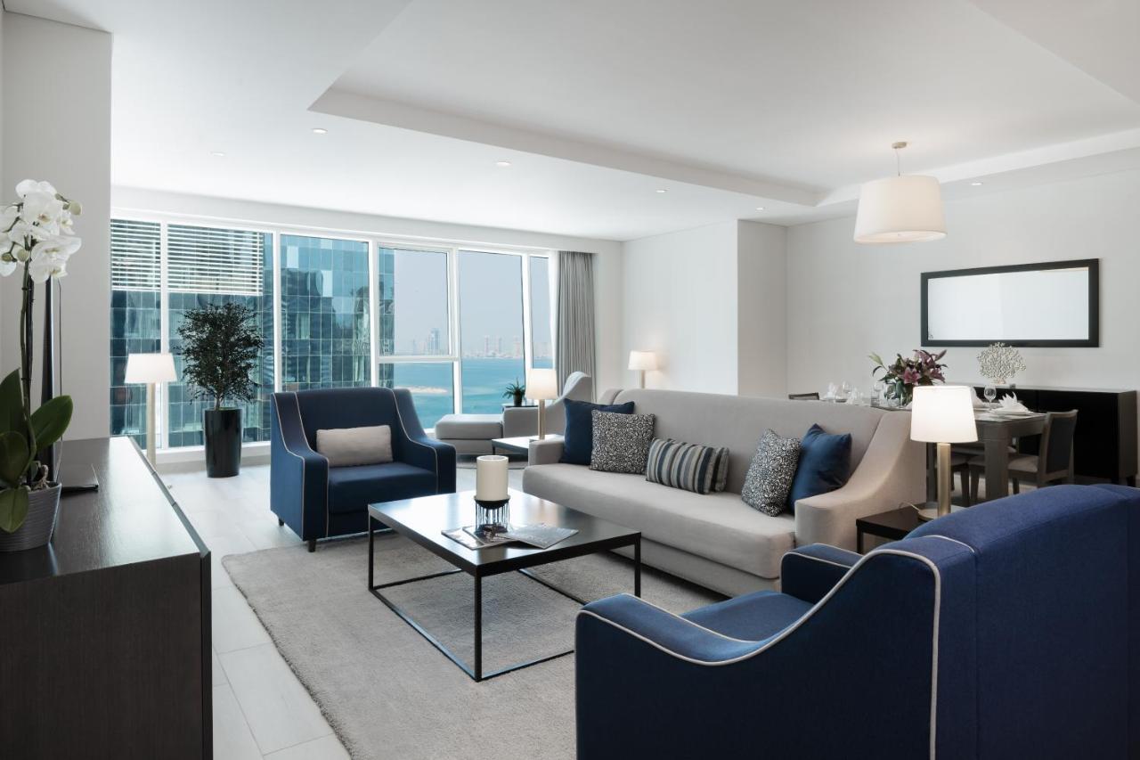 Centara West Bay Hotel & Residences Doha Bagian luar foto A living room at the Ritz-Carlton, Dubai