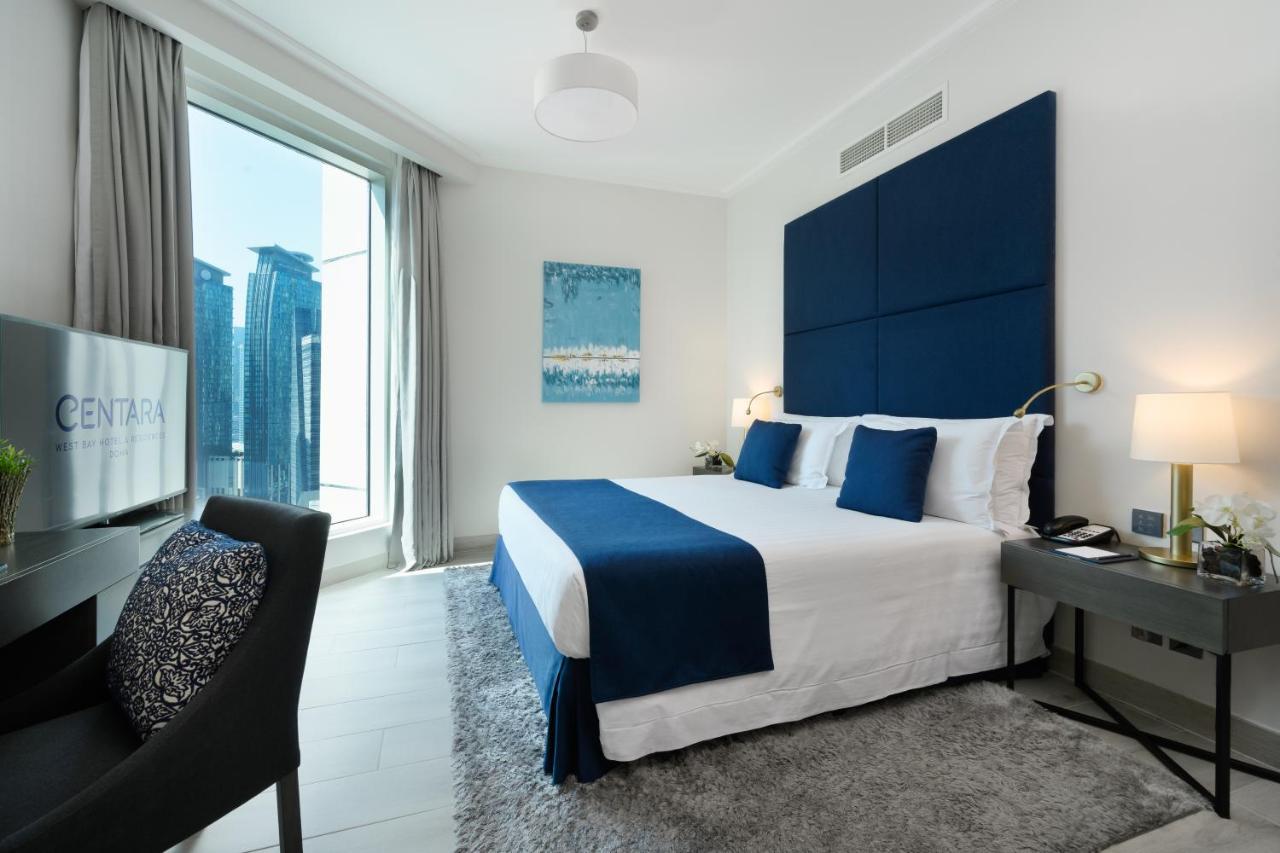 Centara West Bay Hotel & Residences Doha Bagian luar foto A bedroom at the Address Downtown Hotel