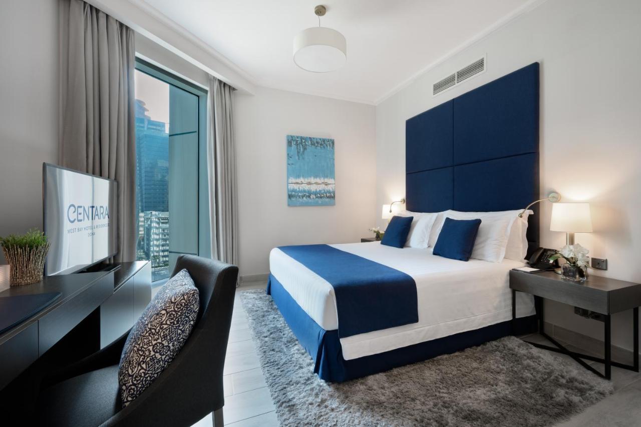 Centara West Bay Hotel & Residences Doha Bagian luar foto A bedroom at the Address Downtown Hotel