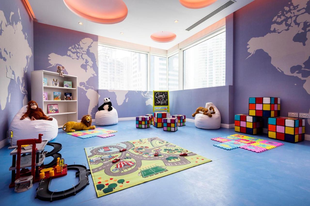 Centara West Bay Hotel & Residences Doha Bagian luar foto The Children's Room